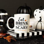 Eat Drink and Be Scary Modern Typography Halloween Coffee Mug<br><div class="desc">This scary cute personalized coffee mug for Halloween features the phrase "Eat Drink and Be Scary" in a modern black typography design with an orange jack o'lantern pumpkin accent and text that can be personalized with "happy halloween",  a family name,  or other choice of text.</div>