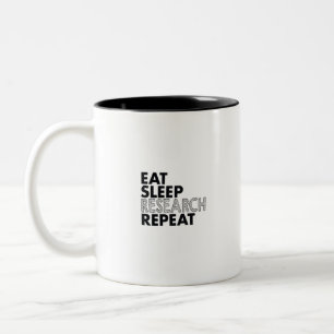 eat sleep research repeat Two-Tone coffee mug