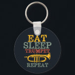Eat Sleep Trumpet Repeat Funny Marching Band Keychain<br><div class="desc">Funny trumpet player design for those playing brass musical instrument in a music band, orchestra or musical performance. Cool vintage retro Jazz music lover merchandise for musician and marching band member. Perfect for music teacher, orchestra fan and those who love to play trumpet. Great Christmas gift and birthday present for...</div>