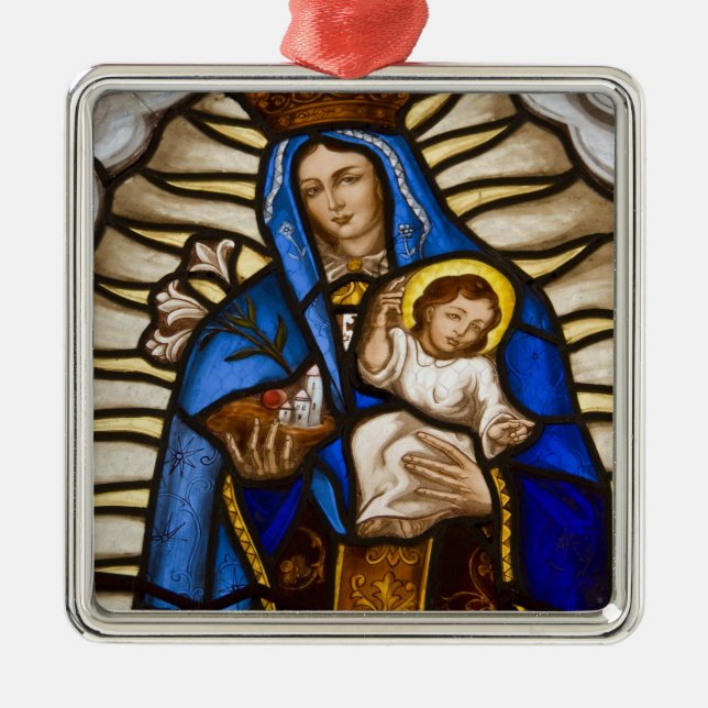 Ecuador, Quito. Statue of the winged Virgin Metal Ornament (Front)