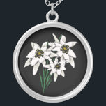 Edelweiss necklace<br><div class="desc">Pretty necklace with graphic artwork of edelweiss flowers, on a black background. Very pretty flowers, with a traditional Alpine look, makes a unique piece of jewelry for yourself or as a gift.</div>
