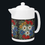 Edelweiss Swiss Alpine Flower Teapot<br><div class="desc">An image of a floral pattern with a needlework look of Edelweiss white Alpine flowers of Europe on your product. Blue,  red,  yellow,  and white colors. Leontopodium alpinum of Switzerland,  Germany,  and Austria.</div>