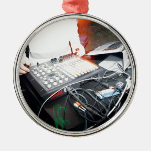EDM DJ mixing music at an underground show Metal Ornament