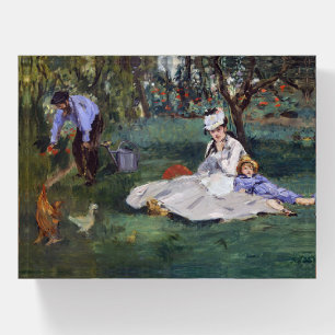 Edouard Manet - The Monet family in their garden Paperweight
