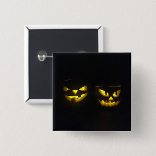 Eeire yellow glow on black creepy pumpkin faces button