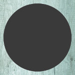 Eerie Black Solid Color Round Paper Coaster<br><div class="desc">An intense and sophisticated deep black that exudes timeless elegance.Perfect for those seeking to make a bold statement.This powerful hue captures the essence of mystery and sophistication.This rich black color is the ultimate choice for a striking and refined aesthetic.</div>