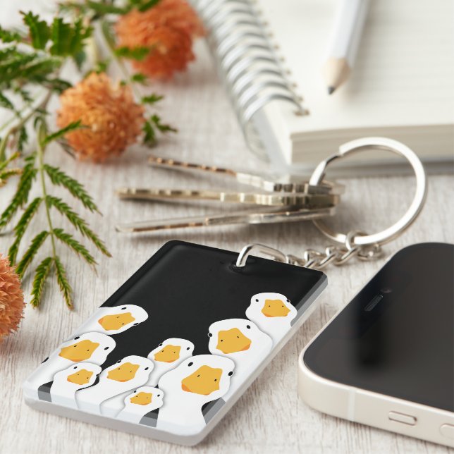 Eerie Surveillance: Geese Monitoring from Space Keychain (Front Right)
