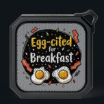 Egg-cited for Breakfast Funny Foodie Pun Design Bluetooth Speaker<br><div class="desc">Start your morning with a smile with this playful "Egg-cited for Breakfast" design, perfect for food lovers and brunch enthusiasts alike. Featuring a charming hand-drawn style, this artwork showcases two sunny-side-up eggs alongside crispy bacon strips, all set against a whimsical backdrop of scattered seasonings and vibrant typography. The warm yellow...</div>