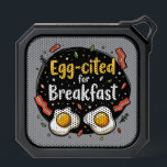 Egg-cited for Breakfast Funny Foodie Pun Design Bluetooth Speaker<br><div class="desc">Start your morning with a smile with this playful "Egg-cited for Breakfast" design, perfect for food lovers and brunch enthusiasts alike. Featuring a charming hand-drawn style, this artwork showcases two sunny-side-up eggs alongside crispy bacon strips, all set against a whimsical backdrop of scattered seasonings and vibrant typography. The warm yellow...</div>