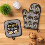 Egg-cited for Breakfast Funny Foodie Pun Design Oven Mitt & Pot Holder Set<br><div class="desc">Start your morning with a smile with this playful "Egg-cited for Breakfast" design, perfect for food lovers and brunch enthusiasts alike. Featuring a charming hand-drawn style, this artwork showcases two sunny-side-up eggs alongside crispy bacon strips, all set against a whimsical backdrop of scattered seasonings and vibrant typography. The warm yellow...</div>