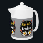 Egg-cited for Breakfast Funny Foodie Pun Design Teapot<br><div class="desc">Start your morning with a smile with this playful "Egg-cited for Breakfast" design, perfect for food lovers and brunch enthusiasts alike. Featuring a charming hand-drawn style, this artwork showcases two sunny-side-up eggs alongside crispy bacon strips, all set against a whimsical backdrop of scattered seasonings and vibrant typography. The warm yellow...</div>
