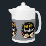 Egg-cited for Breakfast Funny Foodie Pun Design Teapot<br><div class="desc">Start your morning with a smile with this playful "Egg-cited for Breakfast" design, perfect for food lovers and brunch enthusiasts alike. Featuring a charming hand-drawn style, this artwork showcases two sunny-side-up eggs alongside crispy bacon strips, all set against a whimsical backdrop of scattered seasonings and vibrant typography. The warm yellow...</div>