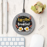 Egg-cited for Breakfast Funny Foodie Pun Design Wireless Charger<br><div class="desc">Start your morning with a smile with this playful "Egg-cited for Breakfast" design, perfect for food lovers and brunch enthusiasts alike. Featuring a charming hand-drawn style, this artwork showcases two sunny-side-up eggs alongside crispy bacon strips, all set against a whimsical backdrop of scattered seasonings and vibrant typography. The warm yellow...</div>