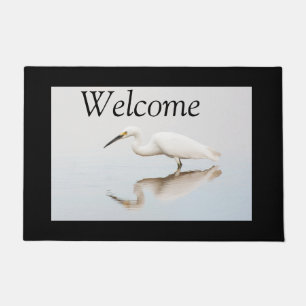 Egret on still pond doormat