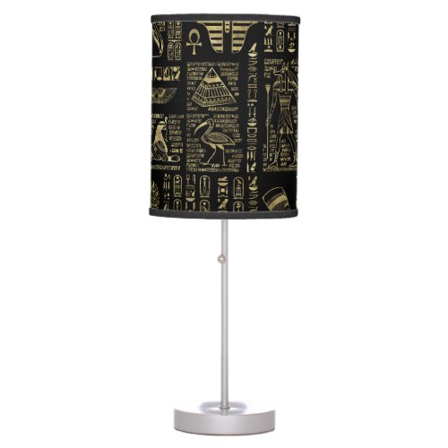 Egyptian hieroglyphs and deities gold on black table lamp