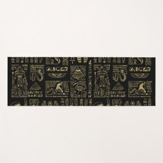 Egyptian hieroglyphs and deities gold on black yoga mat