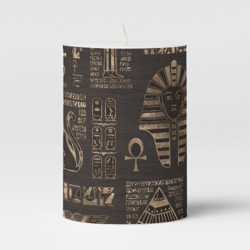 Egyptian hieroglyphs and deities _ gold on wood pillar candle