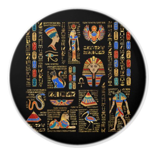 Egyptian hieroglyphs and deities on black ceramic knob