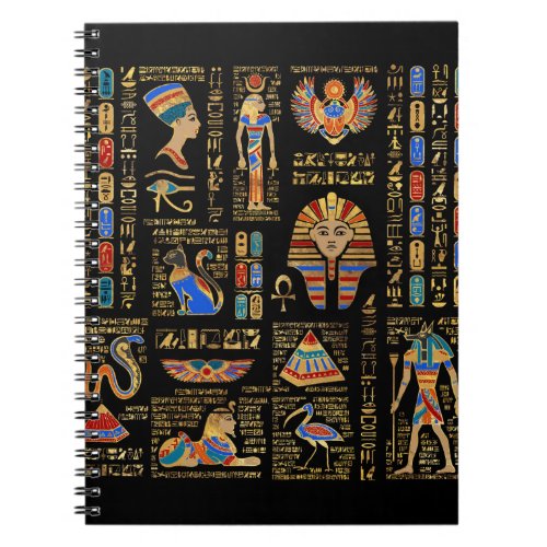 Egyptian hieroglyphs and deities on black notebook