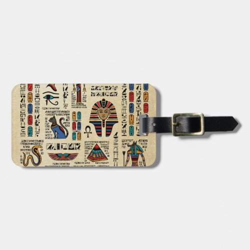 Egyptian hieroglyphs and deities on papyrus luggage tag