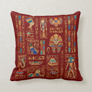 Egyptian hieroglyphs and deities on red throw pillow