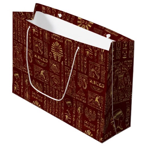 Egyptian hieroglyphs and symbols on red leather large gift bag