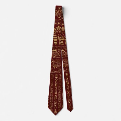 Egyptian hieroglyphs and symbols on red leather neck tie