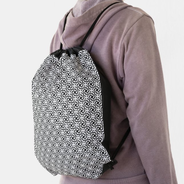 Egyptian tile pattern, black and white messenger b drawstring bag (Insitu)