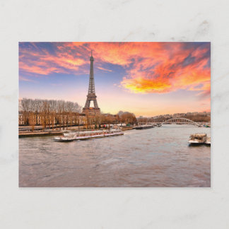 Eifell tower at sunset from Seine in Paris France Postcard