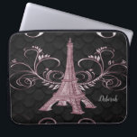 Eiffel Tower Pink Floral Swirls Laptop Sleeve<br><div class="desc">Protect your laptop while you're on the go with an Eiffel Tower Pink Floral Swirls Laptop Sleeve. Laptop sleeve design features a vibrant pink Eiffel Tower embellished with delicate floral swirls. Additional colors available with this design as well. This item may be personalized with a name or monogram of your...</div>