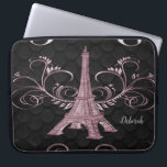 Eiffel Tower Pink Floral Swirls Laptop Sleeve<br><div class="desc">Protect your laptop while you're on the go with an Eiffel Tower Pink Floral Swirls Laptop Sleeve. Laptop sleeve design features a vibrant pink Eiffel Tower embellished with delicate floral swirls. Additional colors available with this design as well. This item may be personalized with a name or monogram of your...</div>