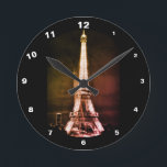 Eiffel Tower - Surreal Art, Paris, France Round Clock<br><div class="desc">CLOCKS: Eiffel Tower surreal vintage artwork with altered second dimension of the tower. Unique portray of this famous landmark from romantic city of love - Paris. Boutique La Pari,  France - Collectible art (private personal collection). Vintage night photography/surreal art series. Original Photography/Art/Design by work4dream.</div>