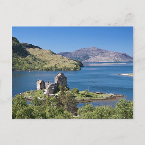 Eilean Donan Castle under a blue sky Postcard