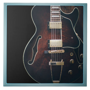 Electric Guitar On Black Ceramic Tile