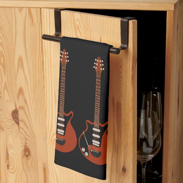 Electric Guitars on Black Towel (Thirds Fold)