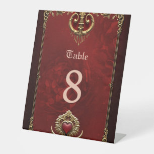 Elegance in red luster with an ornate heart. pedestal sign