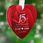 Elegant 15th Rose Wedding Anniversary Ornament<br><div class="desc">Celebrate the 15th rose wedding anniversary with this stylish ornament! Elegant white lettering on a romantic red rose background add a memorable touch for this special occasion and milestone. Personalize with couple's names and wedding date. Reverse shows identical design. Use as is, or replace with a photo. This design is...</div>