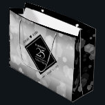 Elegant 25th Silver Wedding Anniversary Large Gift Bag<br><div class="desc">Celebrate the 25th silver wedding anniversary with this stylish gift bag! Elegant black and white lettering with hexagonal confetti on a silver foil background add a memorable touch for this special occasion and extraordinary milestone. Personalize with the couple's names and years of marriage. Reverse shows identical design. For best results...</div>