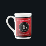 Elegant 36th Rose Wedding Anniversary Celebration Bone China Mug<br><div class="desc">Celebrate the 36th rose wedding anniversary with a couple of these commemorative bone china mugs! Elegant lettering on a romantic red rose background add a memorable touch for this special occasion and extraordinary milestone. Customize with the couple's names, dates of marriage and congratulatory messages. Reverse shows identical design. Design ©...</div>