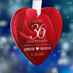 Elegant 36th Rose Wedding Anniversary Celebration Ornament<br><div class="desc">Celebrate the 36th rose wedding anniversary with this stylish ornament! Elegant white lettering on a romantic red rose background add a memorable touch for this special occasion and extraordinary milestone. Personalize with couple's names and wedding date. Reverse shows identical design. Use as is, or replace with a photo. This design...</div>