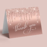 Elegant 50th Birthday Party Rose Gold Glitter Thank You Card<br><div class="desc">Chic 50th birthday party folded thank you card featuring "Thank You" in elegant white calligraphy,  a rose gold faux foil background and rose gold faux glitter. Personalize your thank you message and signature on the inside,  or leave blank for a handwritten note.</div>