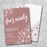 Elegant 90th Birthday Party Invitation<br><div class="desc">Elegant Ninety 90th Birthday Party Invitation. A fun but elegant 50th birthday party invitation with mauve pink and white flowers for the young at heart. Please note that the gold will not have any actual shine to it, it's simply a color. A playful flower pattern frames a script typography "she's...</div>