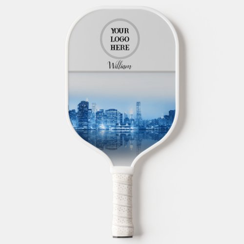 Elegant and modern with a blue city image and logo pickleball paddle