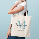 Elegant Aqua Blue Custom Wedding Bridesmaid Name Tote Bag<br><div class="desc">Elegant custom wedding tote bag features a personalized monogram typography design with modern calligraphy script name and serif monogram initial in aqua / teal blue and black colors. Includes custom text for a bridal party title like "BRIDESMAID" or other preferred wording.</div>