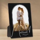 Elegant Arch Wedding Photo Black Plaque<br><div class="desc">A special keepsake features your wedding photo in an elegant arch design with the text "Married" in chic text along with your names and wedding date. Beautiful gift for your family and a fabulous memory to display in your own home. BACKGROUND color can be changed! MORE COLORS in our collection....</div>