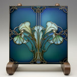 Elegant Art Nouveau Iris Bloom Ceramic Tile<br><div class="desc">Embrace the timeless elegance of Art Nouveau with this exquisite ceramic tile, featuring a stylized iris bloom design that captures the essence of the movement's organic forms and intricate contours. The serene aquamarine background harmonizes with the delicate shades of mint green and seafoam, accented by the sophisticated outlines in antique...</div>