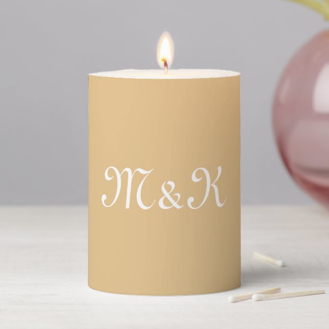 Elegant beige tan script custom couple's initials pillar candle (In Situ)