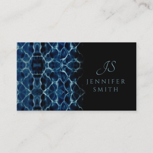 Elegant Black and Blue Ornamental Monogram Business Card