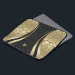 Elegant Black And Gold Damasks Dynamic Stripe Laptop Sleeve<br><div class="desc">Elegant gold tones and black vintage floral damasks combination with gold dynamic lines accents and customizable monogram.</div>