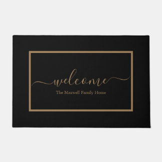 Elegant black and gold script family name welcome doormat